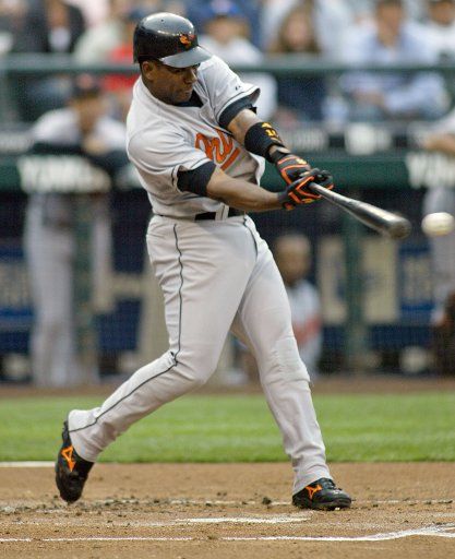 Baltimore Orioles Miguel Tejada hits a double to left field against the Seattle Mariners in the first inning at Safeco Field in Seattle on July 15 2005. (UPI Photo\/Jim Bryant)  