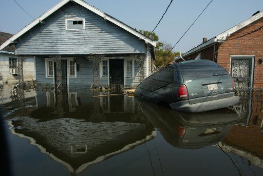Flood water from a levee break caused by Hurricane Katrina fills the streets of the Ninth Ward of New Orleans on Sept. 3 2005.   (UPI Photo\/A.J. Sisco)