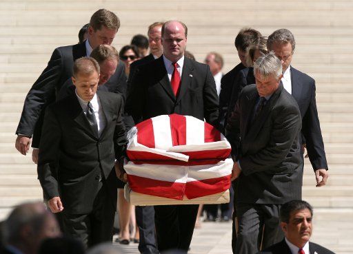 The casket of Supreme Court Chief Justice William H. Rehnquist is carried down the steps of the Supreme Court building during funeral procession on September 7 2005 in Washington.  Rehnquist served on the top court for 33 years.   (UPI Photo\/Kevin...