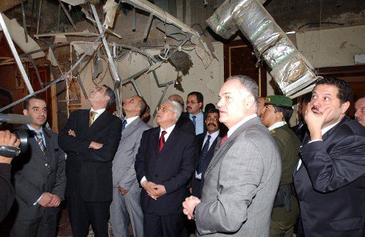 Palestinian President Mahmoud Abbas looks around a room in a hotel that was bombed by terrorists on November 14 2005 in Amman Jordan.   Terrorists struck three hotels on November 9 killing 57 people.   (UPI Photo\/Omar Rashidi\/PA)