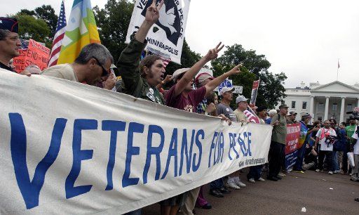 The group Veterans For Peace marches down Pennsylvania Ave. passing The White House in an anti-war protest in Washington on Sept. 24 2005. (UPI\/Photo Kevin Dietsch) 