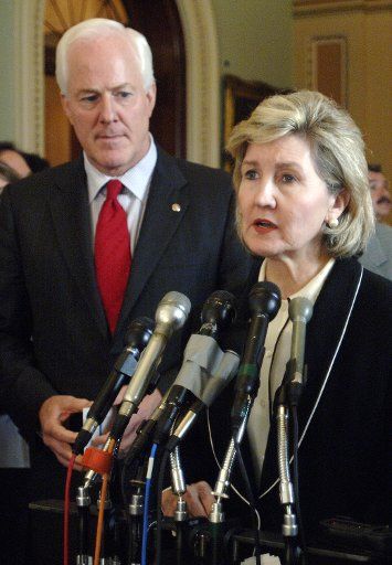 Sen. Kay Baily Hutchison (R-TX) speaks at a press conference next to Sen. John Cornyn (R-TX) at a press conference in the Capitol in Washington on Oct. 5 2005. They focused on border control and the Harriet Miers Supreme Court nomination. (UPI...