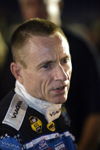 Race car driver Mark Martin awaits the start of the UAW-GM 500 NASCAR Nextel Cup series race at the Lowe\