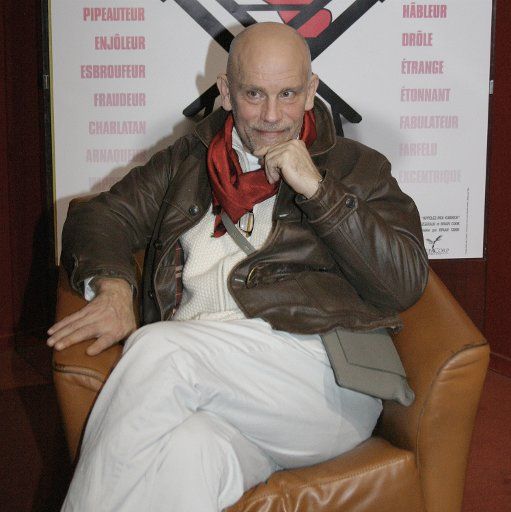 Actor John Malkovich poses before taking questions from the audience after the premiere of his new film "Colour Me Kubrick" at the Forum des Halles in Paris France on November 29 2005.           (UPI Photo\/David Silpa)          