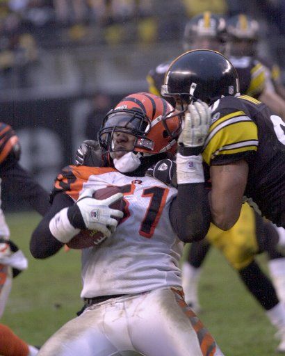 Cincinnati Bengals Odell Thurman intercepts a pass  intended for Pittsburgh Steelers Hines Ward in the fourth quarter of the  Steelers 38 to 31 lost to the Bengals at Heinz Field in Pittsburgh Pennsylvania on December 4 2005 .      (UPI Photo\/Archie...