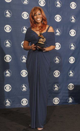 Yolanda Adams holds her Grammy for Best Gospel Song  awarded for "Be Blessed" at the 48th Annual Grammy Awards at the Staples Center in Los Angeles on February 8 2005.  (UPI Photo\/Phil McCarten)  