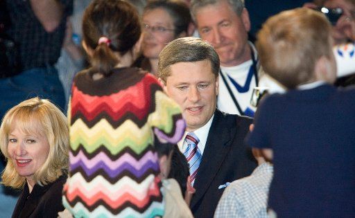 Federal Conservative leader Stephen Harper and his wife Laureen arrive to celebrate with supporters at their campaign headquarters after winning the Canada federal election with a minority January 23 2006. (UPI Photo\/Heinz Ruckemann)