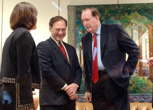 Supreme Court Nominee Samuel Alito (C) meets with Senator John Rockefeller (D-WV) (L) in his office in Washington on January 25 2006. (UPI Photo\/Kevin Dietsch)