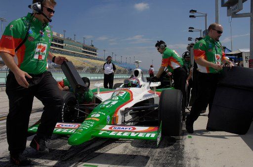 The Crew of race car driver Tony Kanaan makes last minute adjustments for the first practice session of Toyota Indy 300 at the Homestead Speedway in Homestead Florida on March 24 2006.  (UPI Photo\/Marino-Cantrell)