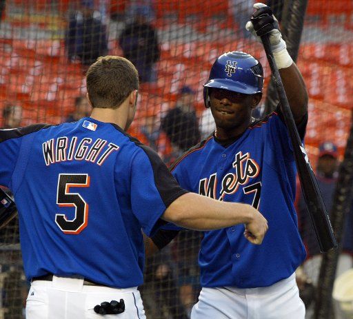 David Wright left and Jose Reyes greet one another during batting practice as the Mets get ready for their home opening game against the Washington DC Nationals at Shea Stadium in New York City on April 3 2006. (UPI Photo\/Monika Graff)