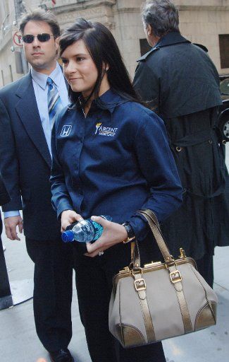 NASCAR driver Danica Patrick one of the 33 qualified Indy 500 drivers takes part in festivities at the New York Stock Exchange on May 22 2006 celebrating the 90th anniversary of 2006 Indy 500. The NYSE has sponsored a car which will compete on...