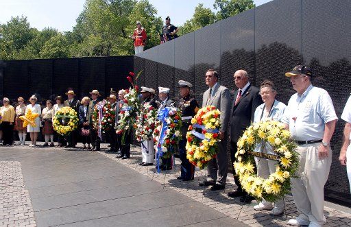 Members of different Veteran and Government Associations place wreaths during a ceremony at the Vietnam Veterans Memorial in Washington DC on May 29 2006. (UPI Photo\/Kevin Dietsch)