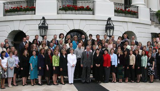 United States President George W. Bush poses for a photo with recipients of the 2005 Presidential Awards for Excellence in Mathematics and Science Teaching at the White House in Washington DC Wednesday May 03 2006.       (UPI Photo\/CHRIS...