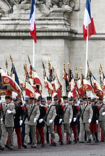 Military personnel parade during the Victory Day ceremonies marking the 61st anniversary of the end of WWII at the Arc de Triomphe in Paris May 8 2006. (UPI Photo\/William Alix)