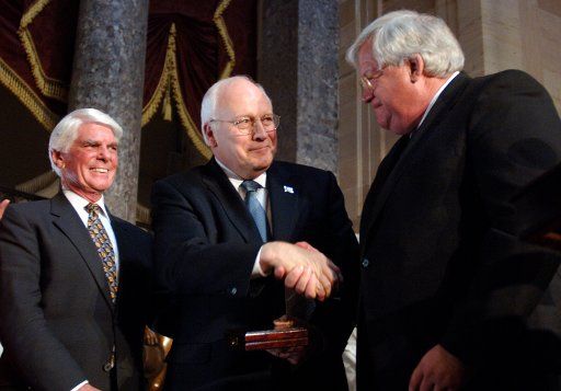 Vice President Dick Cheney (C) receives a Distinguished Service Award from Speaker of the House Denis Hastert (R-IL) at an award ceremony in Washington on May 10 2006. (UPI Photo\/Kevin Dietsch)