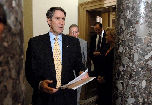Senate Majority Leader Bill Frist (R-TN) makes his way to a press conference on the bipartisan agreement on offshore drilling at a press conference in Washington on July 12 2006. The agreement if passed will open oil drilling off the coast of...