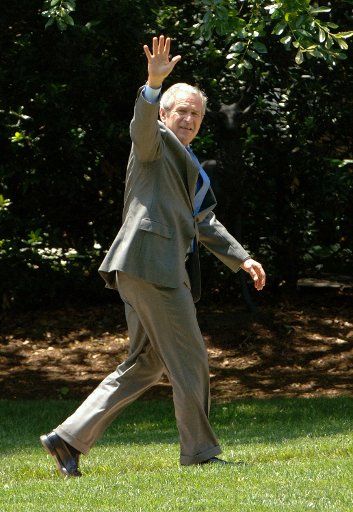U.S. President George W. Bush arrives on the South Lawn of the White House on June 7 2006.     (UPI Photo\/Roger L. Wollenberg)