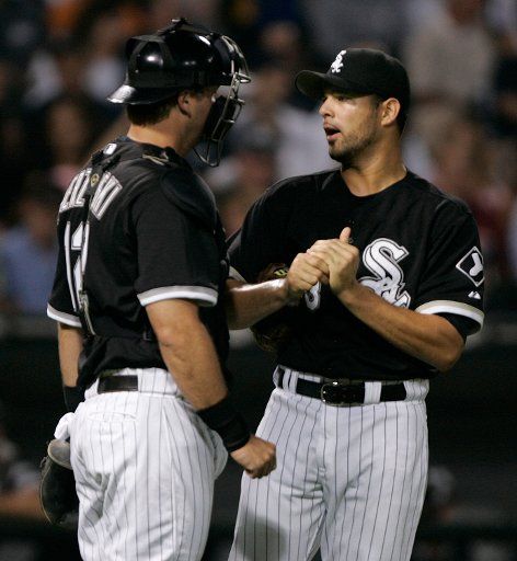 Chicago White Sox starting pitcher Javier Vazquez talks with catcher A.J. Pierzynski during the second inning against the New York Yankees in Chicago on August 10 2006. (UPI Photo\/Brian Kersey)