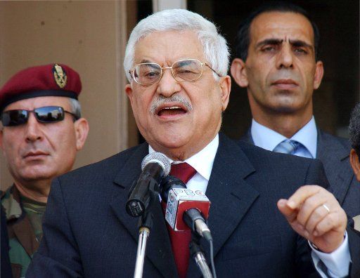 Palestinian President Mahmoud Abbas addresses a government employees\
