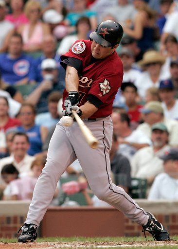 Houston Astros right fielder Lance Berkman (17) takes a cut against the Chicago Cubs at Wrigley Field in Chicago Il July 20 2006. The Cubs defeated the Astros 4-1. (UPI Photo\/Mark Cowan)