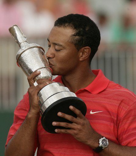 American Tiger Woods kisses the claret jug after winning the   135th British Open Championship at the Royal Liverpool Golf Club in Hoylake July 23 2006. Tiger Woods won the championship with a score of 18 under par. (UPI Photo\/Hugo Philpott)