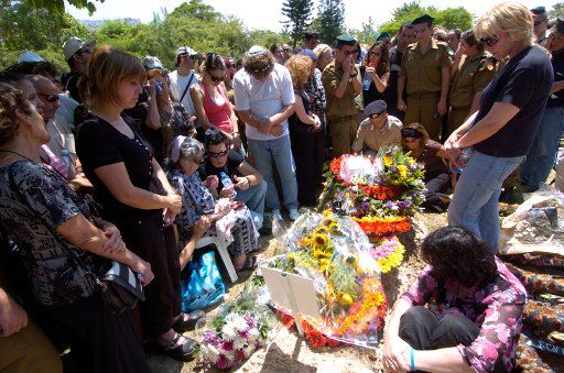 Family and friends mourn at the grave of Sgt. Alon Pintuch 19 killed in southern Lebanon by Hezbollah guerillas at his funeral in Haifa on August 4 2006.  (UPI Photo\/Debbie Hill)