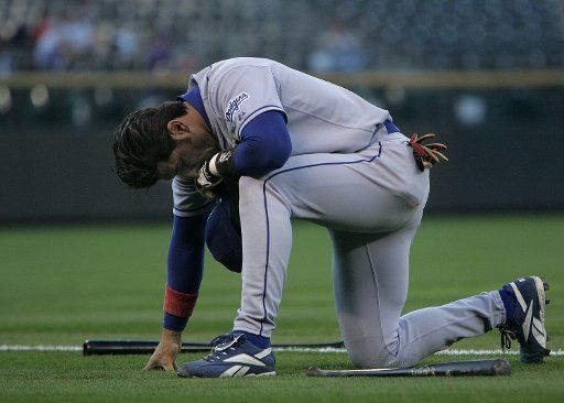 Los Angeles Dodgers Nomar Garciaparra takes a moment while alone in left field prior to game against the Colorado Rockies at Coors Field in Denver September 26 2006. The Dodgers begin a three-game series against the Rockies tied with the Philadelphia...