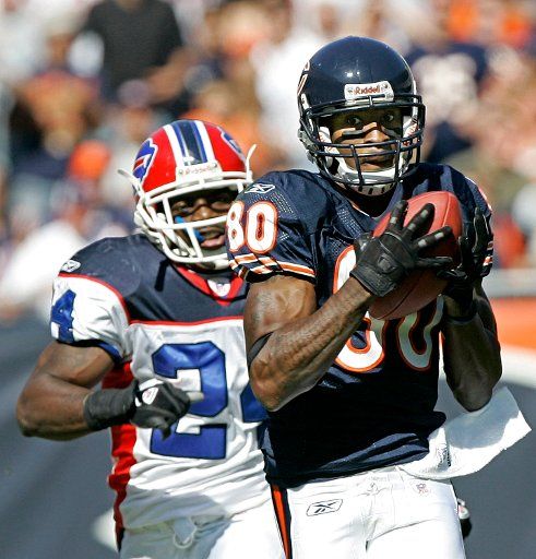 Chicago Bears receiver Bernard Berian (80) hauls in a 62-yard reception as Buffalo Bills cornerback Terrence McGee (24) during the second quarter at Soldier Field in Chicago on October 8 2006. (UPI Photo\/Brian Kersey)