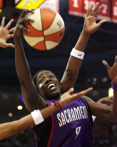 Sacramento Monarchs guard Hamchetou Maiga-Ba (9) grabs a rebound from the Detroit Shock in the first quarter during game five of the WNBA Finals at Joe Louis Arena in Detroit Michigan on September 9 2006.  (UPI Photo\/Scott R. Galvin)