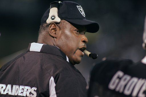 Oakland Raiders Head Coach Art Shell talks to the coaches upstairs during play against the San Diego Chargers at McAfee Coliseum in Oakland California on September 11 2006.  The Chargers jolted the Raiders 27-0.  (UPI Photo\/Terry Schmitt)