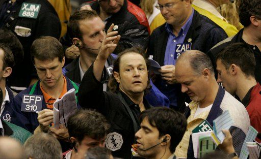 Traders work in the Eurodollar pits at the Chicago Mercantile Exchange (CME) in Chicago on October 17 2006. The CME the world\