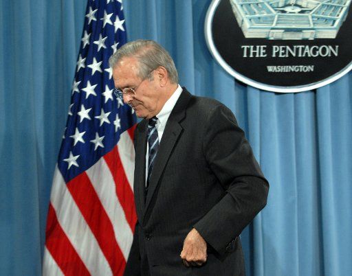 Defense Secretary Donald Rumsfeld departs after discussing Iraq with the media during a briefing at the Pentagon in Arlington Virginia on October 26 2006.  (UPI Photo\/Roger L. Wollenberg)