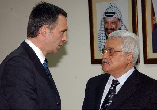 Prime Minister of Norway Jens Stoltenberg (L) meets with Palestinian President Mahmoud Abbas in Ramallah on December 20 2006.  (UPI Photo\/Omar Rashidi\/PA)                          