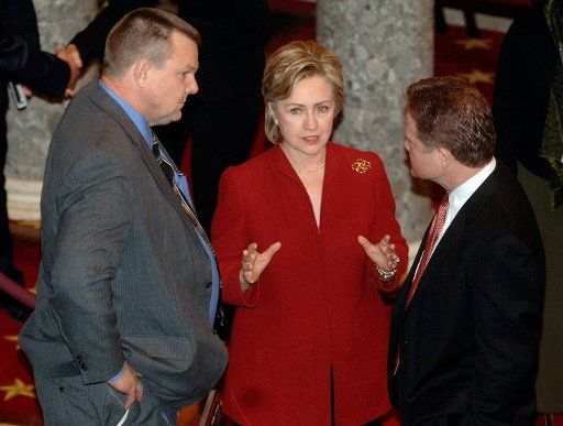 Senator Hillary Clinton (D-NY) (C) talks to Sen. Jim Webb (D-VA) (L) and Sen. Jon Tester (MO-D) prior to a Senate Bipartisan Caucus Meeting in the Old Senate Chambers of the Capitol Building in Washington on January 4 2006. (UPI Photo\/Kevin Dietsch)