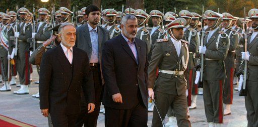 Palestinian Prime Minister Ismail Haniyeh (C) and Iran\