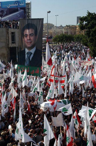 Hundreds of thousands of Lebanese converge on Martyrs square in the center of Beirut as the coffin of Lebanese Minister of Industry Pierre Gemayel makes its way to the church on November 23 2006. Pierre Gemayel son of former Lebanese President Amin...