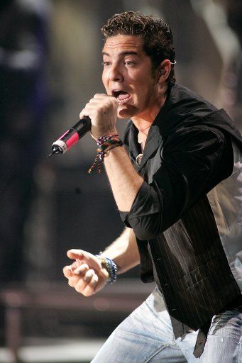 David Bisbal performs in concert during the Viva Romance show at the American Airlines Arena in Miami on March 3 2006. (UPI Photo\/Michael Bush)