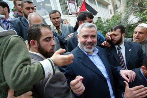 Palestinian Prime Minister Ismail Haniyeh (C) attends protest with the relatives of prisoners during demonstration calling for the release of Palestinian prisoners from Israeli jails in Gaza city in Gaza Strip April 16 2007.   (UPI Photo\/Ismael...