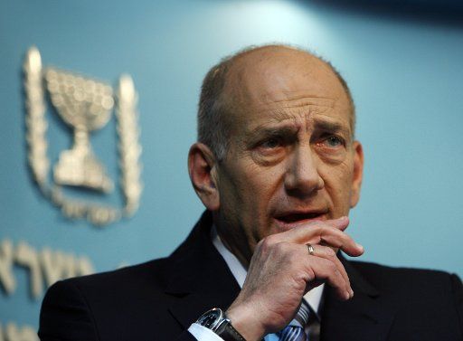 Israeli Prime Minister Ehud Olmert speaks about his three-year plan to combat poverty and increase employment opportunities at his Jerusalem offices on April 18 2007. (UPI Photo\/Jim Hollander\/POOL)