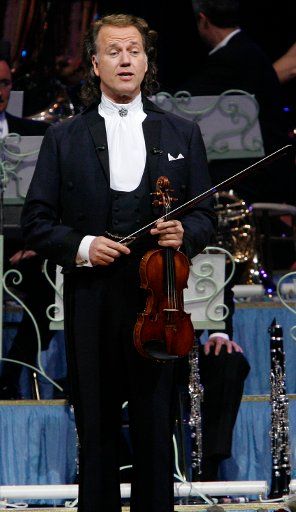Dutch violinist and composer Andre Rieu performs with his orchestra at Bercy in Paris on March 20 2007.   (UPI Photo\/David Silpa)   