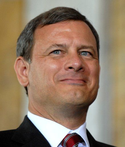 Chief Justice John Roberts shown in July 10 2006 file photo suffered a seizure on July 30th that caused him to fall in Maine. Roberts was kept overnight for observation. (UPI Photo\/Roger Wollenberg\/FILES)