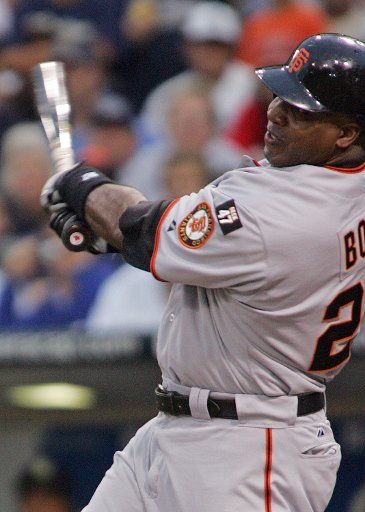San Francisco Giants left fielder Barry Bonds hits his 755th home run in the second inning against the San Diego Padres at Petco Park in San Diego on August 4 2007. Bonds is tied with Hank Aaron for career home runs at 755. (UPI Photo\/Roger ...