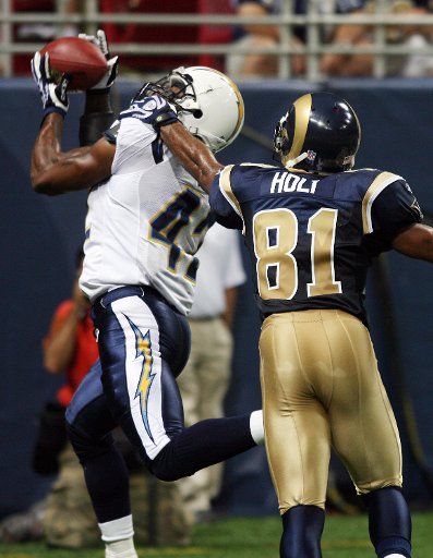 San Diego Chargers Clinton Hart (L) pulls down an interception on a ball intended for St. Louis Rams Torry Holt in the second quarter of pre-season action at the Edward Jones Dome in St. Louis on August 18 2007. (UPI Photo\/Bill Greenblatt)