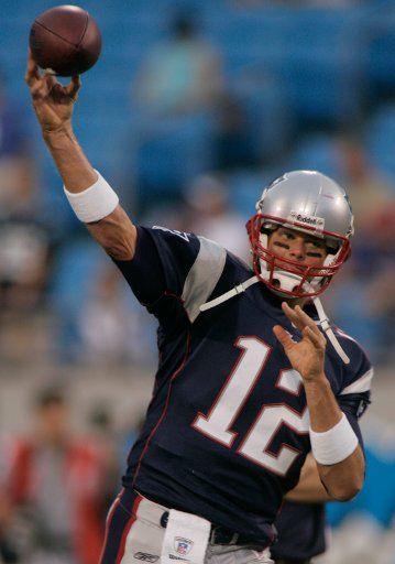 New England Patriots quarterback Tom Brady warms up prior to a pre-season game against the Carolina Panthers at Bank of America Stadium on August 24 2007 in Charlotte NC. (UPI Photo\/Bob Carey