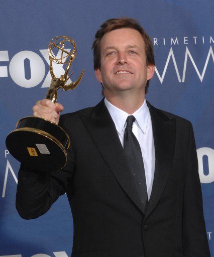 Phillip Martin displays his Emmy for work on \