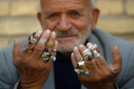 An Iranian vendor shows his rings for sale in Bazaar of Qazvin province 91 Miles (165 Km) west of Tehran Iran on September 27 2007. (UPI Photo\/Mohammad Kheirkhah)