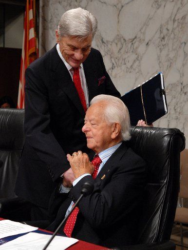 Sen. John Warner R-VA (L) greets Sen. Robert Byrd D-WV before a Senate Armed Services Committee hearing to discuss the findings of the Iraqi Security Forces Independent Assessment Commission Report on Capitol Hill in Washington on September 6 ...