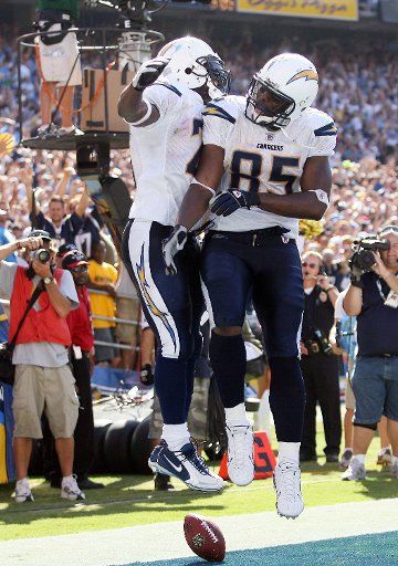 San Diego Chargers running back LaDainian Tomlinson (left) celebrates with tight end Antonio Gates (#85) after scoring a touchdown in the fourth quarter against the Chicago Bears at Qualcomm Stadium in San Diego Sept. 9 2007. (UPI Photo\/Robert ...