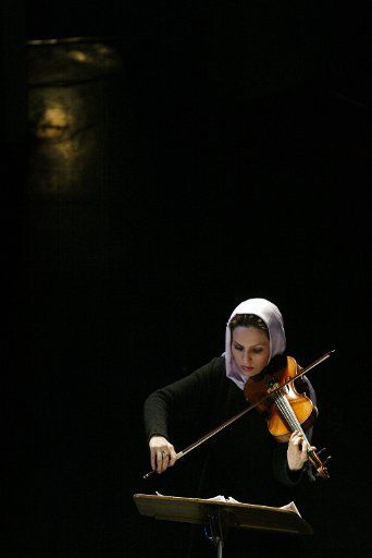 Iranian Monica Loran plays violin at the 23rd International Fajr Music Festival in Vahdat hall in Tehran Iran on December 26 2007 (UPI Photo\/Mohammad Kheirkhah)