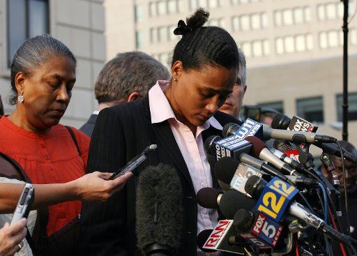 Marion Jones looks down while speaking to the media outside the U.S District Court House in White Plains New York on October 5 2007. Jones pleaded guilty Friday to lying to federal investigators about taking banned substances. (UPI Photo\/John ...